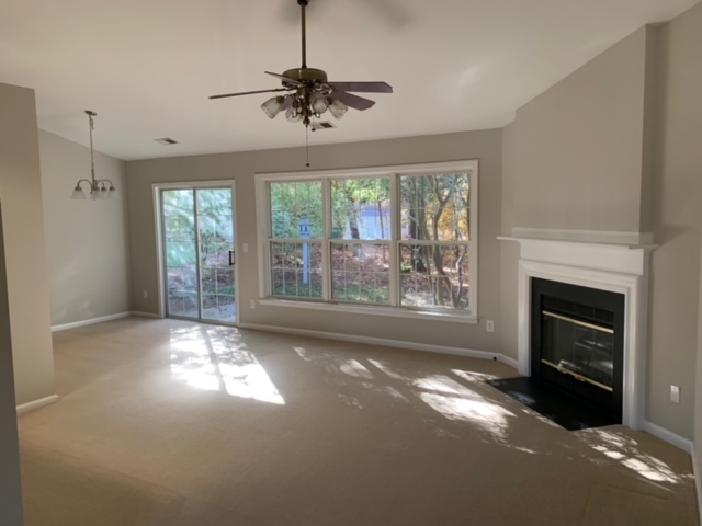 Vaulted ceiling w/gas log fireplace in great room - 3801 Windstream Way