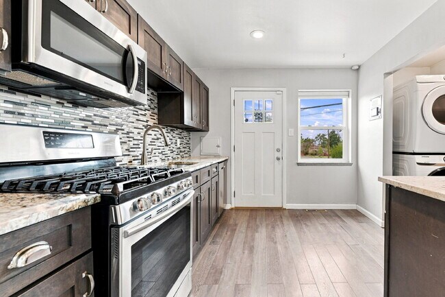 Building Photo - $2,220.95 with $300 Off the first month's rent, 2 Beds - 2 Bath, Duplex in Denver with Washer and...