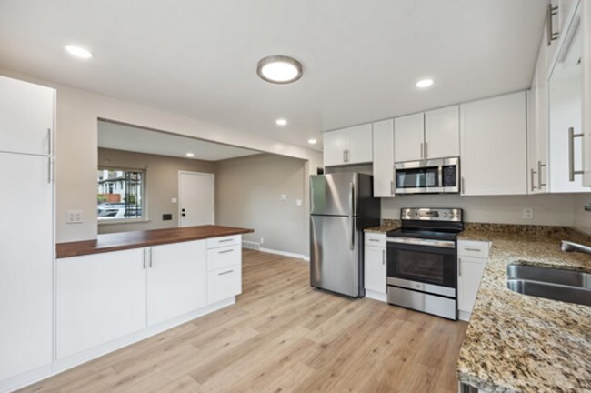Building Photo - Welcome home to Denver's Potter Highlands ...