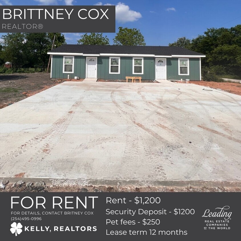 Front view with parking - 301 E Bowie Ave