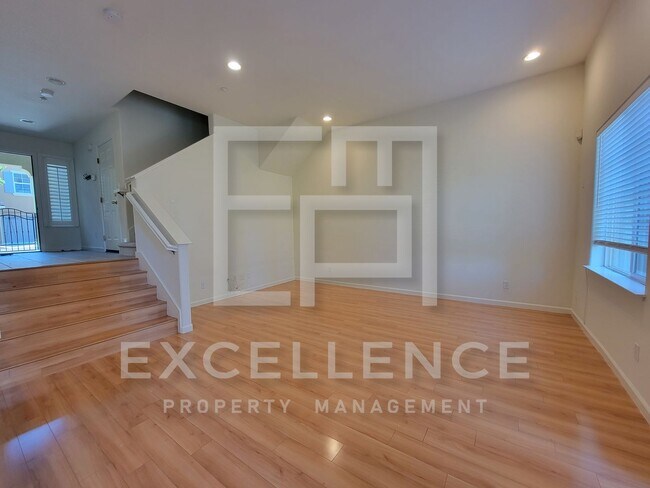 Building Photo - Spacious 3/2.5 Located In Communication Hills, With Two 1 Car Garages, W/D & Large Master Retreat