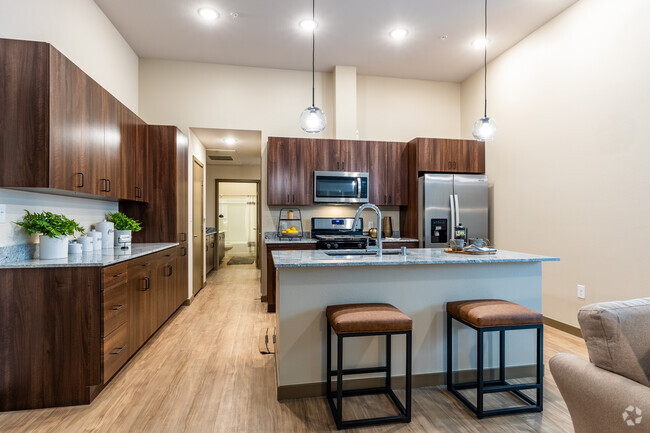 2 BR, 1 BA - 933 SF - Brownstone