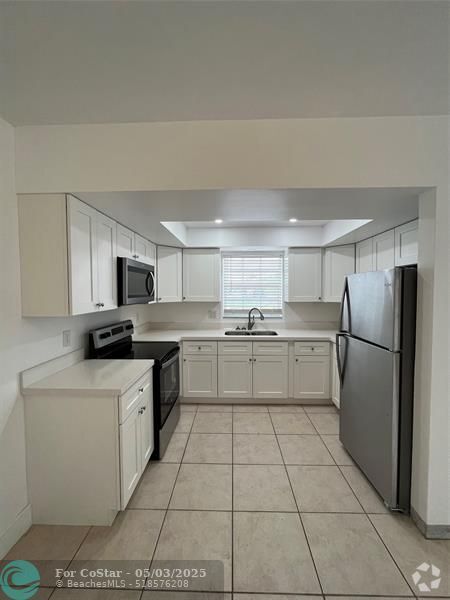 Building Photo - 1017 NW 30th Ct