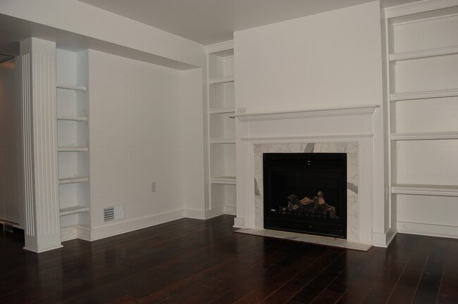 Working fireplace in living room. - 485 Elmwood Ave