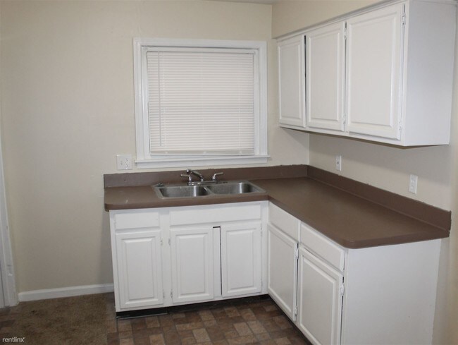 Building Photo - 3 br, 1 bath House - 1044 Magnolia Dr