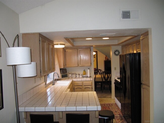 Building Photo - 10604 Rancho Carmel Dr