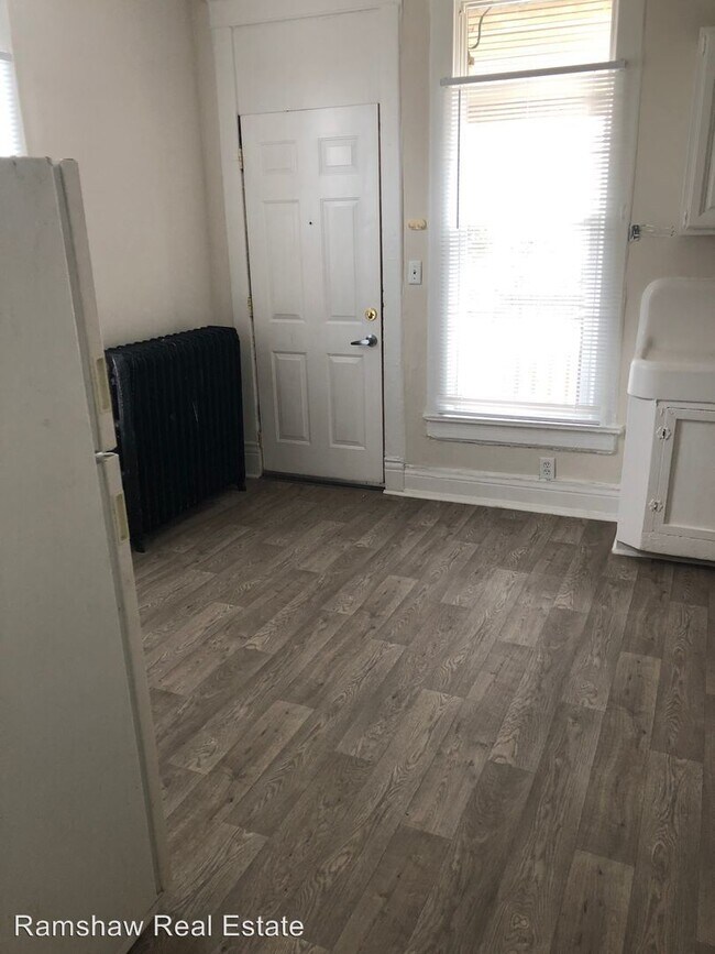 Building Photo - Studio, 1 bath Apartment - 703 W. Park