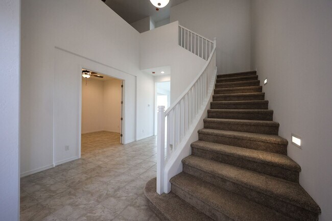 Building Photo - 7695 W Smoketree Dr