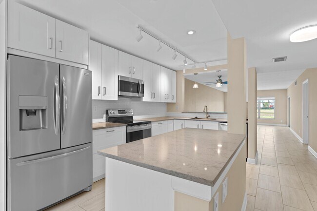 Building Photo - 5760 Princess Palm Ct