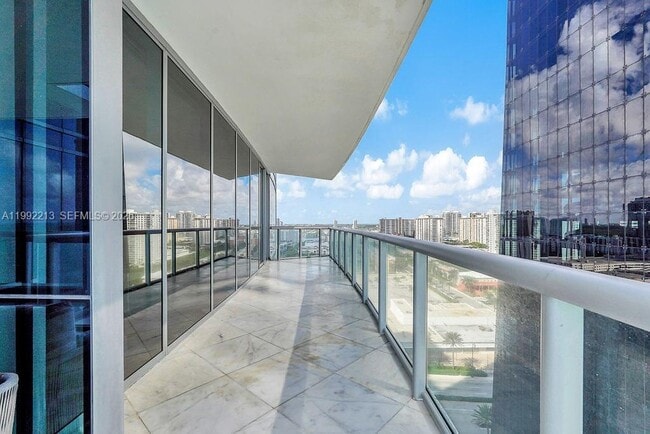 Building Photo - 17121 Collins Ave