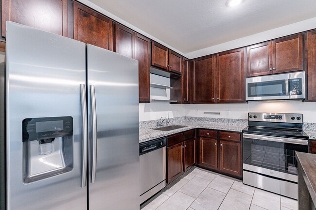 Building Photo - Three Bedrooms & Two Baths - Great Location