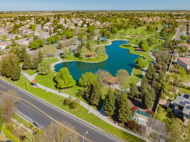 Del Lago Park offers a large lake and playground for Tulare residents to enjoy.
