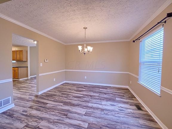 Building Photo - 6284 Beaumont Square