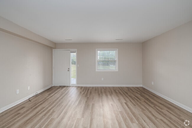 2BR, 1.5BA - 1,088SF - Living Room - The Meadows at Ithaca Townhomes