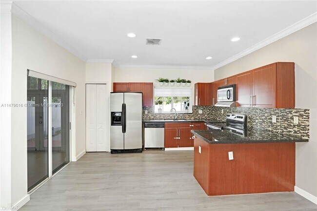 Foto del edificio - 3 br, 3.5 bath Townhome - 12953 SW 49th Ct