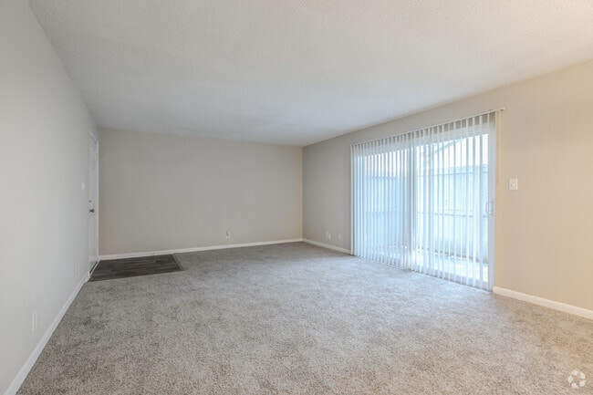 3BR, 2BA - 1,260SF - Living Room - The Park at Northside