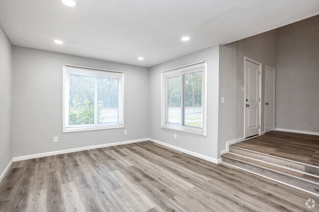 3BR, 1.5BA - 1,142SF - Living Room - Lakeside Reserve