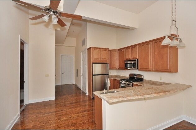  - 48-54 E 13th St