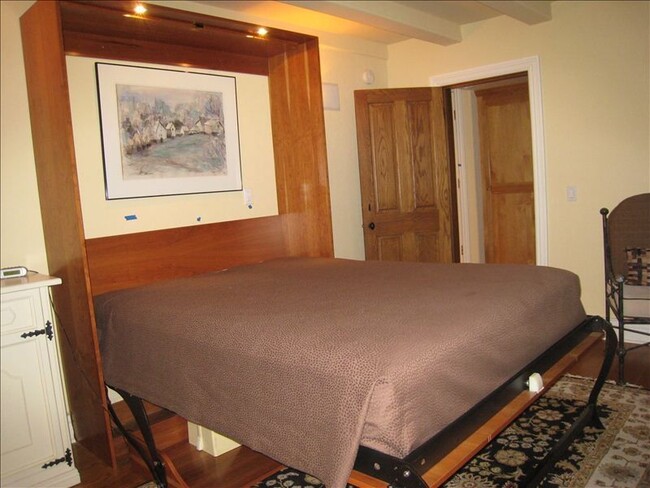 Murphy bed in bedroom one. Turns into a desk when closed. - 501 Beach Dr