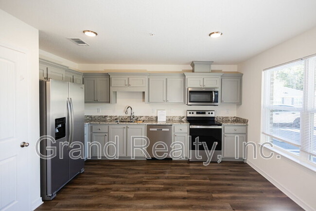 Foto del edificio - 6801 Whitney Polk Ct