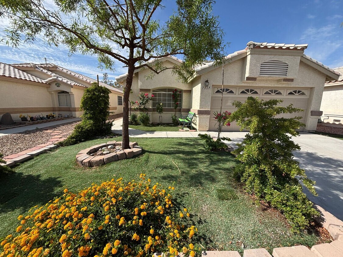 Primary Photo - This inviting single-story home boasts a s...