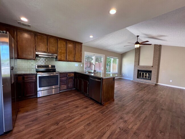 Building Photo - Centrally Located 4-Bedroom Home with Spac...