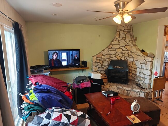 Living room with wood fireplace. - 29 Peter Way