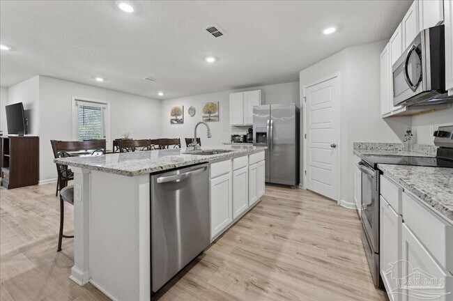 Foto del edificio - 6320 Burrow Ln
