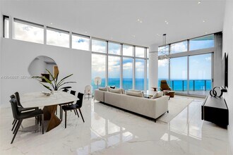 Building Photo - 15701 Collins Ave