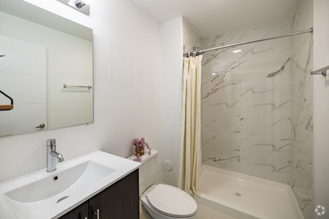 2BR, 2BA - 1,176SF - Model D - Primary Bathroom - Modern Towers Apartments