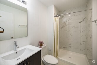 2BR, 2BA - 1,176SF - Model D - Primary Bathroom - Modern Towers Apartments