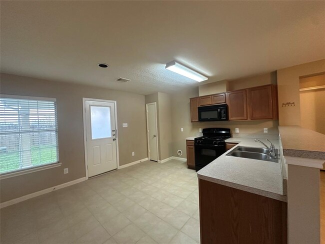 Foto del edificio - 12910 Regal Oaks Bend Ln