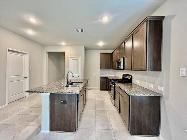 Building Photo - 8711 Windsong Trail Dr