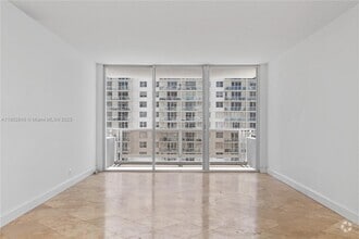Building Photo - 5700 Collins Ave