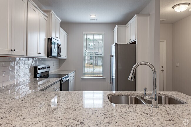 2 habitaciones, 2 baños - 1285 pies cuadrados - Cocina - Copper Ridge Townhomes