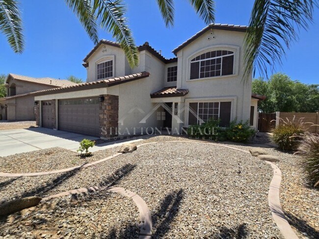 Building Photo - 1005 E Stirrup Ln