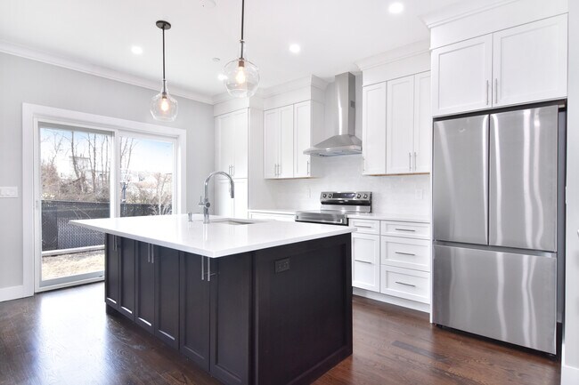 Kitchen w/ Stainless Steel Appliances and Oversized Island - 13 English Ln