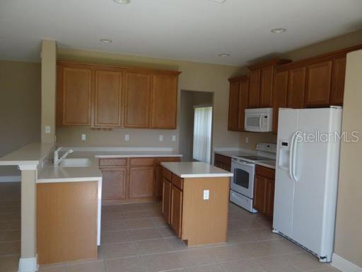 Building Photo - 2811 Suncoast Lakes Blvd