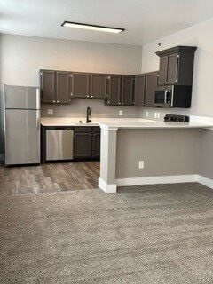 Countertop Bar & Kitchen Area One Bedroom Floorplan "F" - Edge 21 Apartments