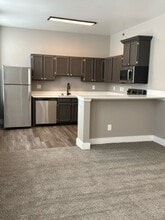 Countertop Bar & Kitchen Area One Bedroom Floorplan "F" - Edge 21 Apartments