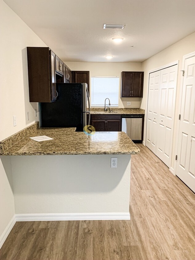 Primary Photo - Modern Comfort with Lawn Care Included! Ap...