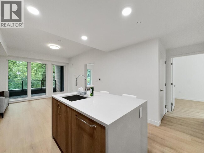 Photo du bâtiment - 133 W 49th Ave