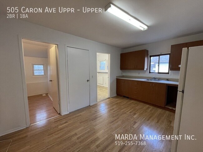 Building Photo - COZY 2 BED/1 BATH UPPER DUPLEX ON CARON 40% OF HYDRO, WATER & GAS!