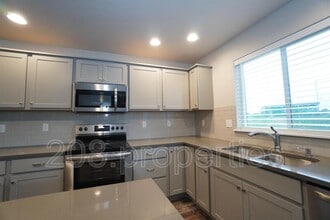 Building Photo - 13776 S Piano Ave