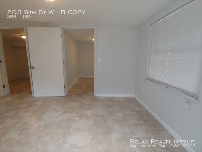 Building Photo - 203 9th St W