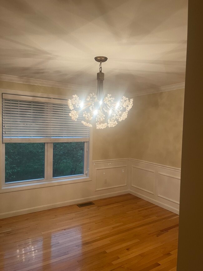 dining room, with high end light and crown/chair moulding - 11 Pinecrest Dr
