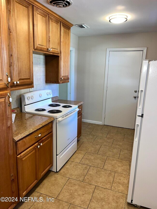 Building Photo - 6560 Barmer Dr S