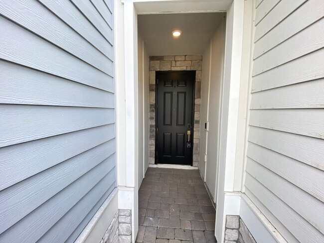 Photo - Spacious 3B/2.5B Townhouse with 2-Car Gara...