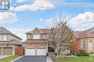 Building Photo - 355 McCartney Crescent