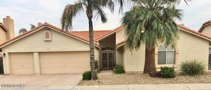 Building Photo - 5639 E Aire Libre Ave